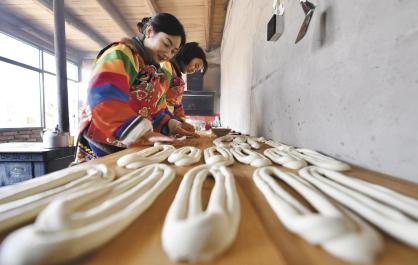 【新春走基层】油香四溢迎新年